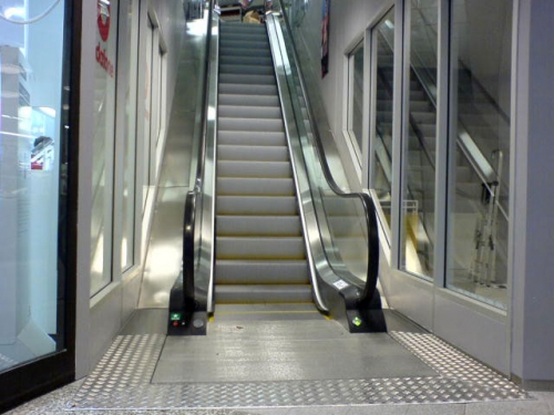 Step escalator